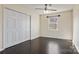 This cozy bedroom has dark wood vinyl floors, great closet space, and natural light at 2948 Christy Leigh Dr, Newton, NC 28658