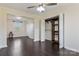 This bedroom boasts dark wood vinyl flooring, natural light, and ceiling fan at 2948 Christy Leigh Dr, Newton, NC 28658