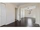Open bedroom view showing hardwood flooring and bright natural light at 2948 Christy Leigh Dr, Newton, NC 28658