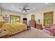Bedroom with ample storage and natural light, and a view of the outdoors at 307 Stillwater Rd, Troutman, NC 28166