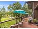 Inviting deck with seating overlooks a serene lake, perfect for outdoor relaxation and enjoying scenic views at 307 Stillwater Rd, Troutman, NC 28166