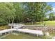 Beautiful view of the lake from the dock, perfect for enjoying the outdoors at 307 Stillwater Rd, Troutman, NC 28166