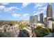 Bright aerial cityscape with buildings and parking lots at 333 W Trade St # 1802, Charlotte, NC 28202