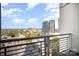 Balcony view of city featuring tall buildings and parking at 333 W Trade St # 1802, Charlotte, NC 28202