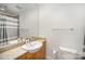 Bright bathroom includes decorative bottles, granite countertops, and a convenient towel bar at 333 W Trade St # 1802, Charlotte, NC 28202