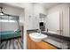 Cozy bathroom showcasing granite countertop, undermount sink, and a large mirror at 333 W Trade St # 1802, Charlotte, NC 28202