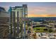 Daytime view of the city skyline with baseball stadium near to a modern apartment building at 333 W Trade St # 1802, Charlotte, NC 28202