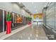 Modern lobby featuring sleek design elements, recessed lighting and vibrant artwork at 333 W Trade St # 1802, Charlotte, NC 28202