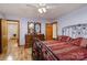 Bedroom with an ensuite bath and a view of wood floors at 3720 Lanes Creek Rd, Marshville, NC 28103