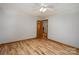 Neutral bedroom with hardwood floors, offering a blank canvas for personalized decor and comfort at 3720 Lanes Creek Rd, Marshville, NC 28103