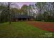 Single story brick home with a covered porch and a cleared area at 3720 Lanes Creek Rd, Marshville, NC 28103