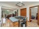Kitchen with gas cooktop island and view into dining room at 3720 Lanes Creek Rd, Marshville, NC 28103