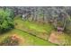Property featuring partially wooded area, a grass lawn, and a shed with fenced-in land at 3720 Lanes Creek Rd, Marshville, NC 28103