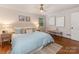 Serene main bedroom featuring a plush bed, soothing colors, and stylish accent pieces at 3911 Kitley Pl, Charlotte, NC 28210
