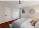 Comfortable main bedroom with ample closet space, neutral tones, and a large window for natural light at 3911 Kitley Pl, Charlotte, NC 28210