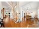 Foyer with hardwood flooring, staircase, and an open layout with views into other living spaces at 4098 Kiser Cove Ln, Terrell, NC 28682