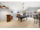 Game room with billiards table, bar, and sliding door access to deck at 4098 Kiser Cove Ln, Terrell, NC 28682