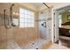 Modern bathroom features a glass shower, tile surround, and built-in shelving at 4098 Kiser Cove Ln, Terrell, NC 28682