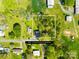 Aerial view showcases property with .54 acres lot in a serene, wooded setting at 4375 Creek Ave, Midland, NC 28107