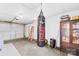 Spacious garage and basement with storage and pull up doors at 4375 Creek Ave, Midland, NC 28107