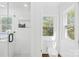 Bright bathroom featuring a glass shower with subway tile and updated fixtures at 4375 Creek Ave, Midland, NC 28107