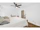 Cozy bedroom with ceiling fan, wood floors, and natural light at 4375 Creek Ave, Midland, NC 28107