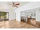 Open-concept living space flowing into a bright kitchen with modern appliances and ample counter space at 4375 Creek Ave, Midland, NC 28107