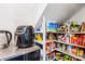 Pantry stocked with food and appliances, featuring custom shelving at 4375 Creek Ave, Midland, NC 28107