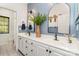 Bright bathroom featuring double sinks, modern fixtures, and stylish decor at 4511 Morning Dove Ct, Denver, NC 28037