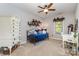 Bedroom features a charming daybed, bookshelf, and a view from the bright window at 4511 Morning Dove Ct, Denver, NC 28037