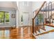 Bright foyer with hardwood floors and staircase at 4511 Morning Dove Ct, Denver, NC 28037