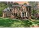 Beautiful brick home with a manicured lawn and stately entrance at 4511 Morning Dove Ct, Denver, NC 28037