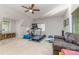 Bright home gym featuring various workout machines, large window, and comfortable seating at 4511 Morning Dove Ct, Denver, NC 28037