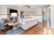 Cozy living room with fireplace, hardwood floors, and modern decor at 4511 Morning Dove Ct, Denver, NC 28037