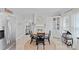 Bright dining room with a round table, neutral colors, and ample natural light at 481 Union Cemetery Sw Rd, Concord, NC 28027