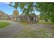 Charming home with a welcoming porch and beautifully landscaped yard at 481 Union Cemetery Sw Rd, Concord, NC 28027