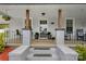 Inviting porch entrance with brick steps and wooden support beams at 481 Union Cemetery Sw Rd, Concord, NC 28027