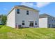 Well-maintained backyard featuring a lush lawn, sliding glass doors, and newly installed sod at 5016 Poplin Vly, Cherryville, NC 28021