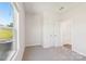 Bedroom with window views, carpet, and white trim at 5016 Poplin Vly, Cherryville, NC 28021