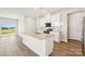Bright kitchen featuring stainless steel appliances, granite countertops, and an island at 5016 Poplin Vly, Cherryville, NC 28021