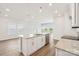 Bright kitchen area featuring a large island, stainless steel appliances, and hardwood floors, with natural light at 5016 Poplin Vly, Cherryville, NC 28021