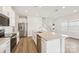 Bright, modern kitchen with white cabinets, stainless steel appliances, and a large island, perfect for entertaining at 5016 Poplin Vly, Cherryville, NC 28021