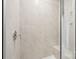 Contemporary shower with tiled walls, a glass door, and a built-in seat at 5016 Poplin Vly, Cherryville, NC 28021
