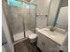 Modern bathroom featuring marble-look shower tiles, a glass shower door, and a vanity with a sleek sink at 5100 Verona Rd # 96, Charlotte, NC 28213