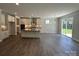 Bright kitchen with a center island, stainless steel hood, and plentiful cabinet storage at 5100 Verona Rd # 96, Charlotte, NC 28213
