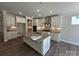 Spacious kitchen featuring a large center island, stainless steel appliances and stylish cabinetry at 5100 Verona Rd # 96, Charlotte, NC 28213
