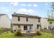 Spacious backyard with a brick patio, outdoor dining area, and well-maintained lawn at 512 Red Oak Ct, Tega Cay, SC 29708
