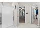 Hallway view of the bathroom, Primary bedroom, and walk in closet from the standing shower at 512 Red Oak Ct, Tega Cay, SC 29708