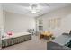 Neutral toned bedroom with a toy kitchen set, cozy carpet and lots of natural light at 512 Red Oak Ct, Tega Cay, SC 29708