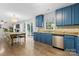 Bright eat-in kitchen with granite countertops, stainless steel appliances, and sliding glass door to backyard at 512 Red Oak Ct, Tega Cay, SC 29708